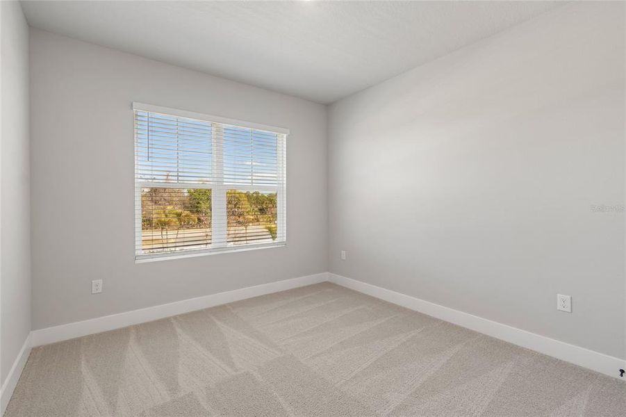 Spacious, unfurnished interior of a new home in Emerald Landing at Waterside at Lakewood Ranch – Towns, Sarasota (Image 31).