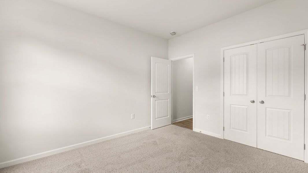 Representative unfurnished interior of a home built from the Halton by D.R. Horton in Liberty Crossing, Braselton (Image 22).