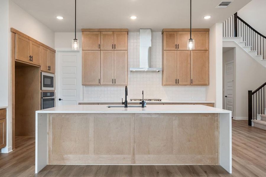 Furnished interior view inside a new home in Heritage, Dripping Springs (Image 6).