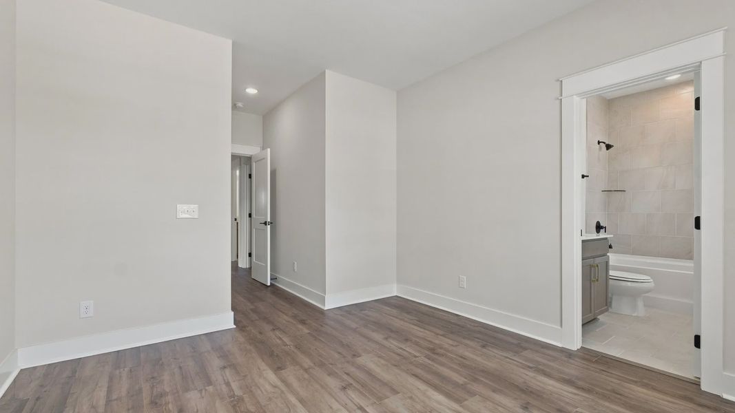 Upstairs bedroom with convenient connected bathroom.