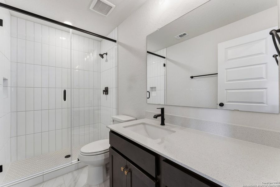 Furnished interior view inside a new home in Davis Ranch 60', San Antonio (Image 12).