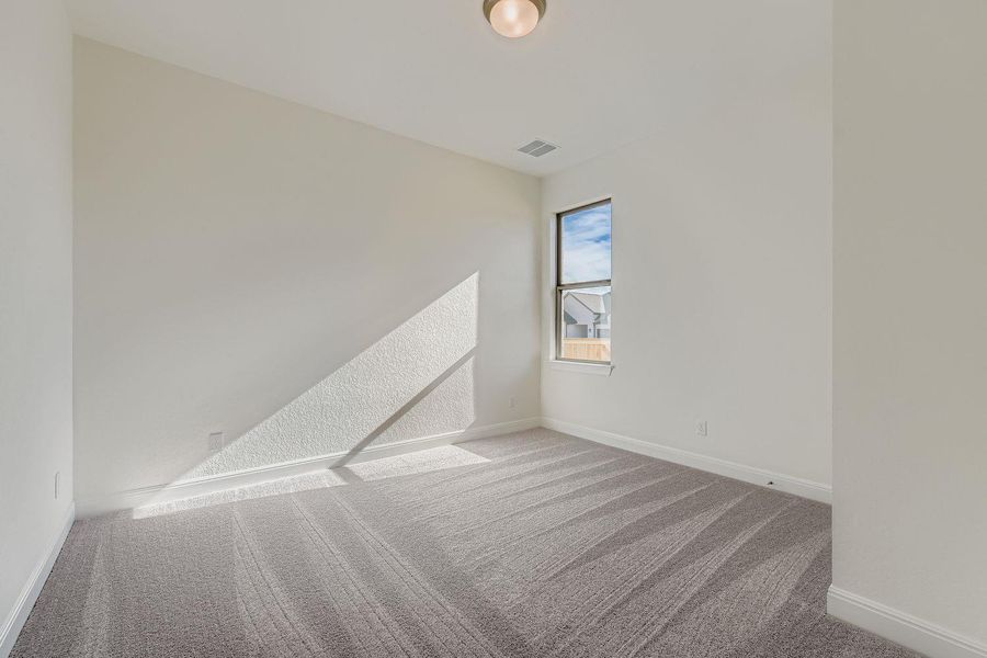 Spacious, unfurnished interior of a new home in 6 Creeks, Kyle (Image 9).