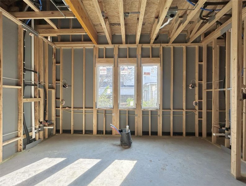 Primary Bathroom to Feature Dual Vanities, a Separate Shower, and a Freestanding Soaking Tub. Construction Photo as of 3/13/2026 Primary Bathroom to Feature Dual Vanities, a Separate Shower, and a Freestanding Soaking Tub. Construction Photo as of 3/13/2026