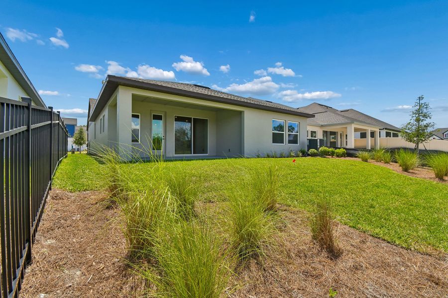 Representative exterior details of a home built from the The Northglen by David Weekley Homes in Palmeras at Crossprairie – The Grove Collection, St. Cloud (Image 4).