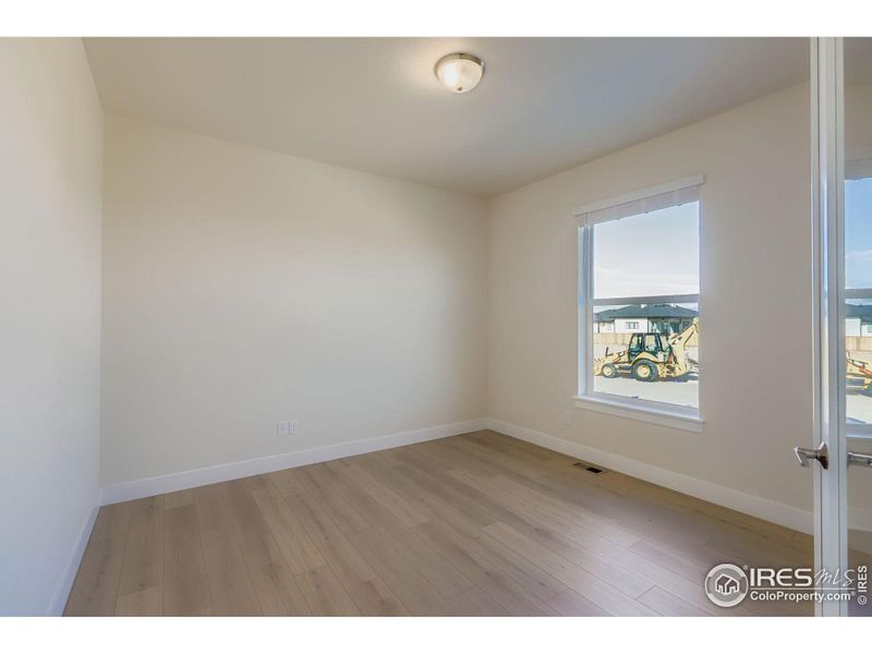 Spacious, unfurnished interior of a new home in RainDance National 60/70, Windsor (Image 22).