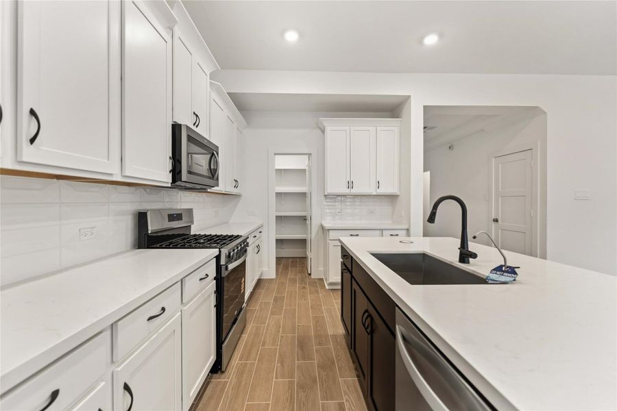 Furnished interior view inside a new home in Sunterra, Katy (Image 12). Furnished interior view inside a new home in Sunterra, Katy (Image 12).