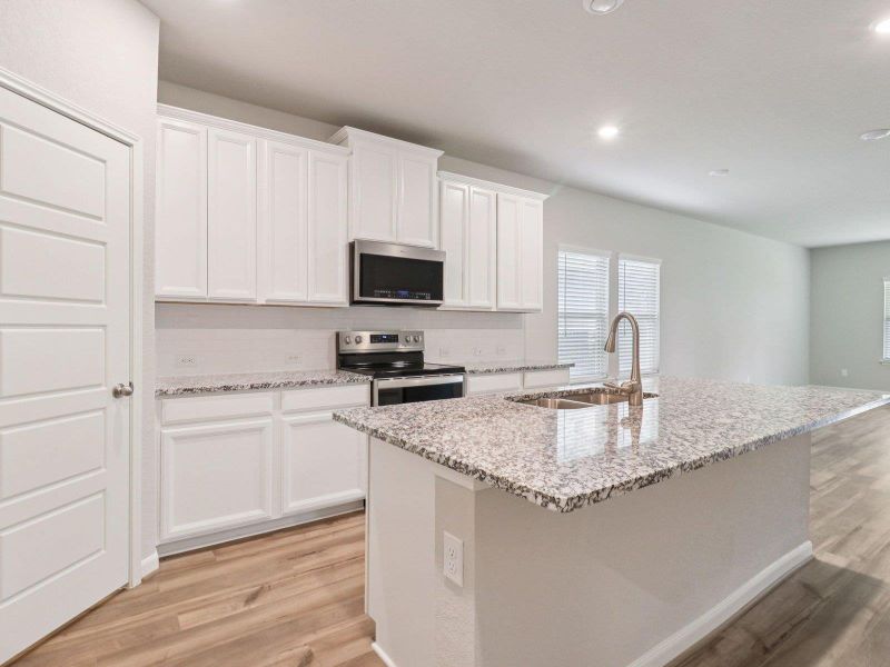 Photo is not of the actual home, but is an inspirational photo of builder’s model home and may depict options, furnishings, and/or decorator features that are not included