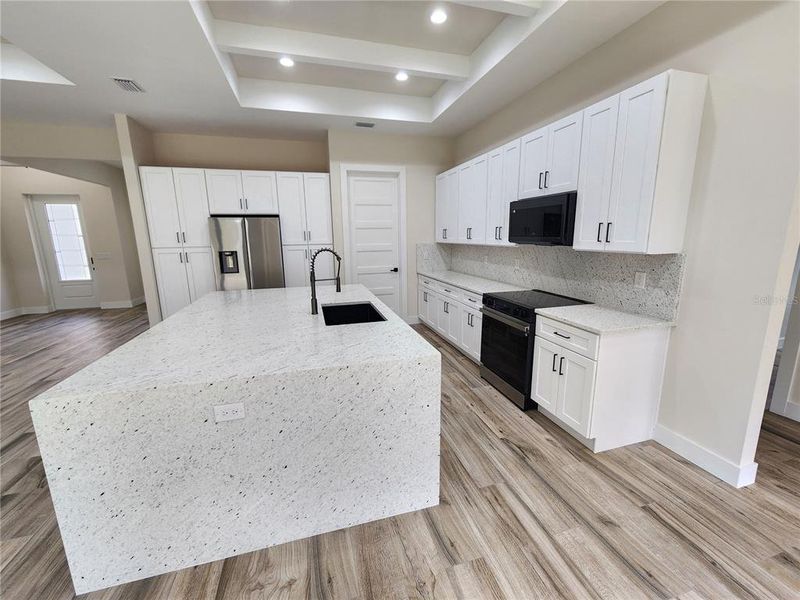 Furnished interior view inside a new home in , Port Charlotte (Image 6). Furnished interior view inside a new home in , Port Charlotte (Image 6).