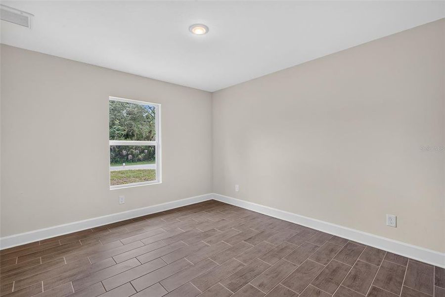 Spacious, unfurnished interior of a new home in , Port Charlotte (Image 16). Spacious, unfurnished interior of a new home in , Port Charlotte (Image 16).