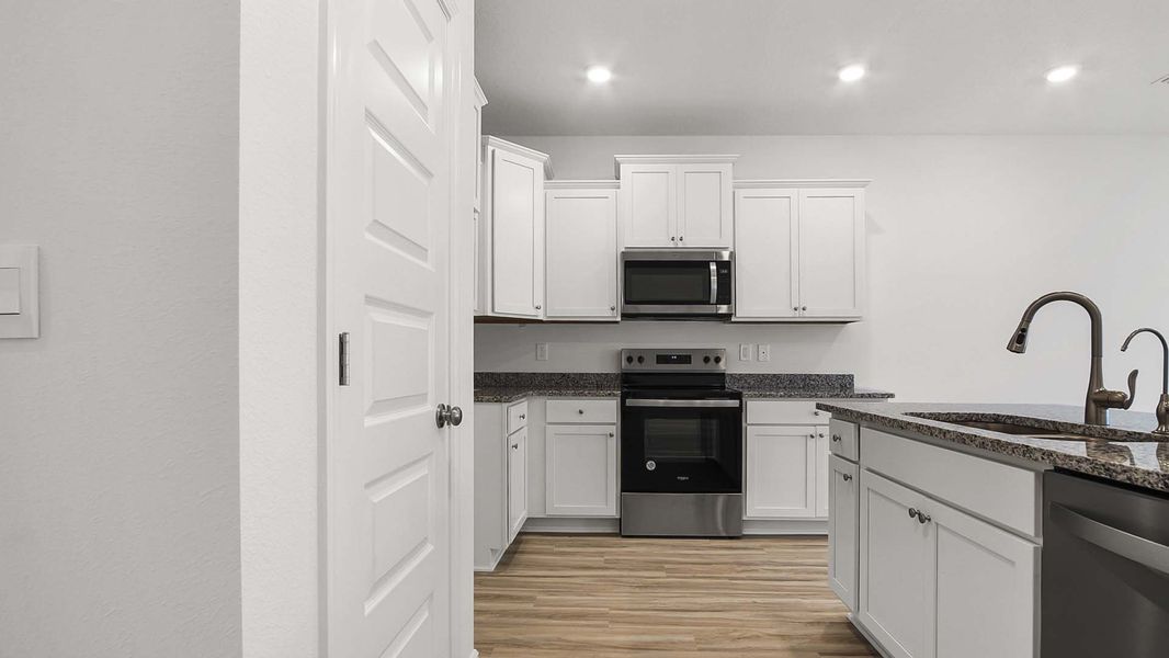 Furnished interior view inside a new home in Hawks Landing Townhomes, Santa Rosa Beach (Image 3).