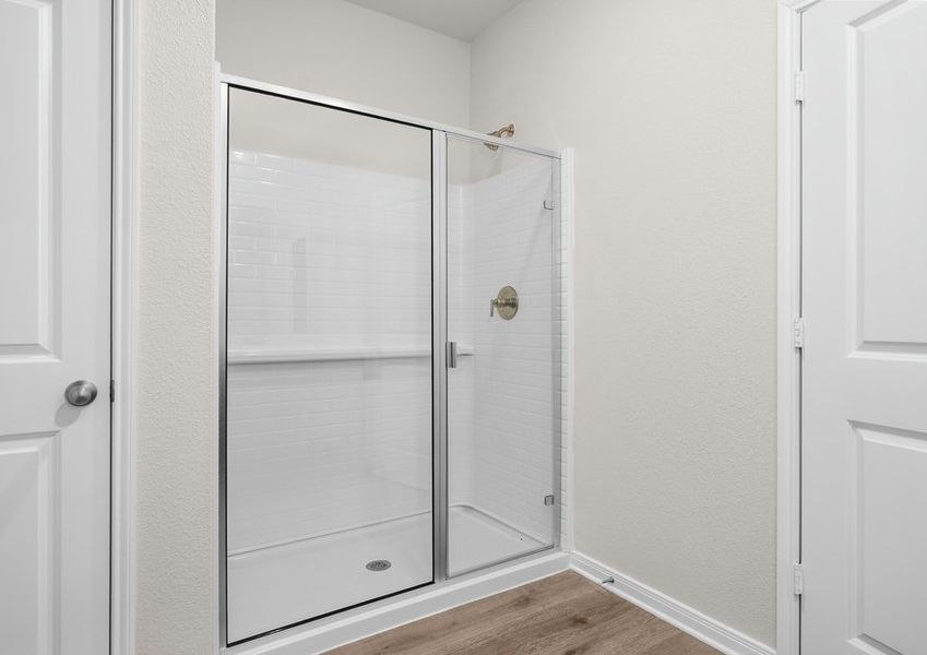The master bathroom has a glass walk-in shower. The master bathroom has a glass walk-in shower.
