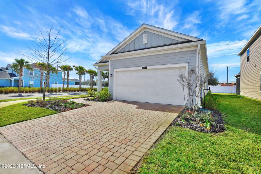 Front exterior of a new home in , Jacksonville, FL, highlighting curb appeal (Image 20).