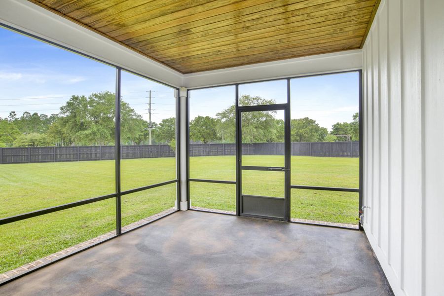 Exterior details and patio area of a home in Coastal Communities, Edgewater (Image 33).