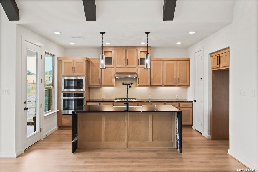 Furnished interior view inside a new home in The Crossvine, Schertz (Image 11).