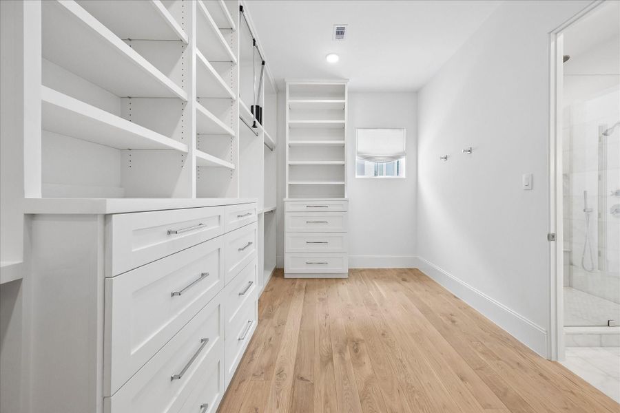 Another view of the spacious primary closet.