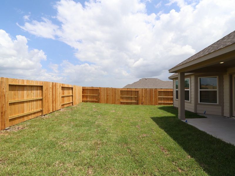 Front exterior of a new home in Lago Mar, Santa Fe, TX, highlighting curb appeal (Image 14). Front exterior of a new home in Lago Mar, Santa Fe, TX, highlighting curb appeal (Image 14).