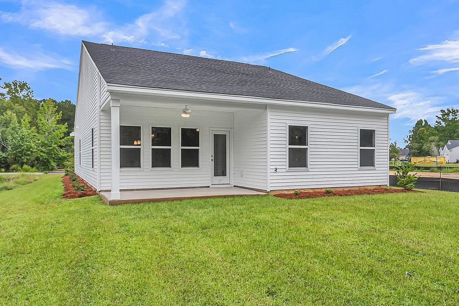 Exterior details and patio area of a home in Fairway Woods at Wyboo, Manning (Image 20).