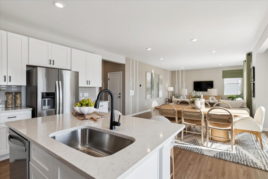A kitchen with white cabinets. A kitchen with white cabinets.