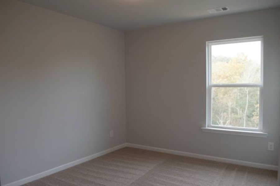 Representative unfurnished interior of a home built from the Mayfield by Piedmont Residential in The Reserve at Willow Oaks, Canton (Image 30).