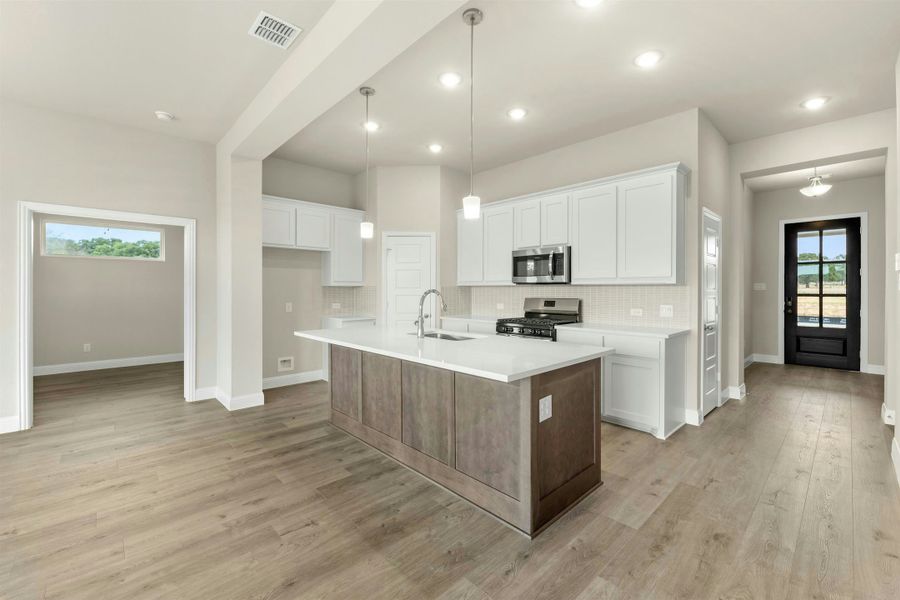 Representative furnished interior of a home built from the Bluebonnet by Kindred Homes in Dominion Park, Waxahachie (Image 8).