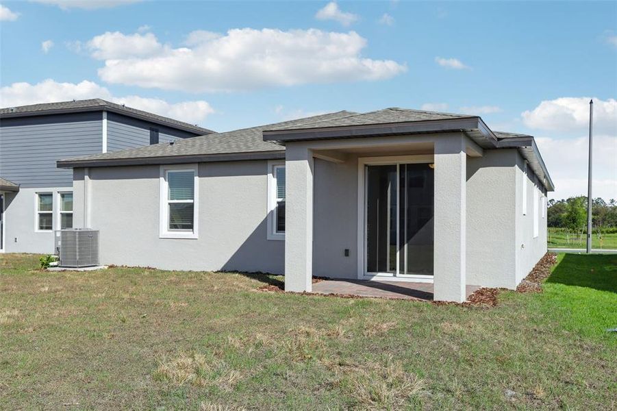 Front exterior of a new home in Springs at Lake Alfred - Signature Series, Lake Alfred, FL, highlighting curb appeal (Image 24).