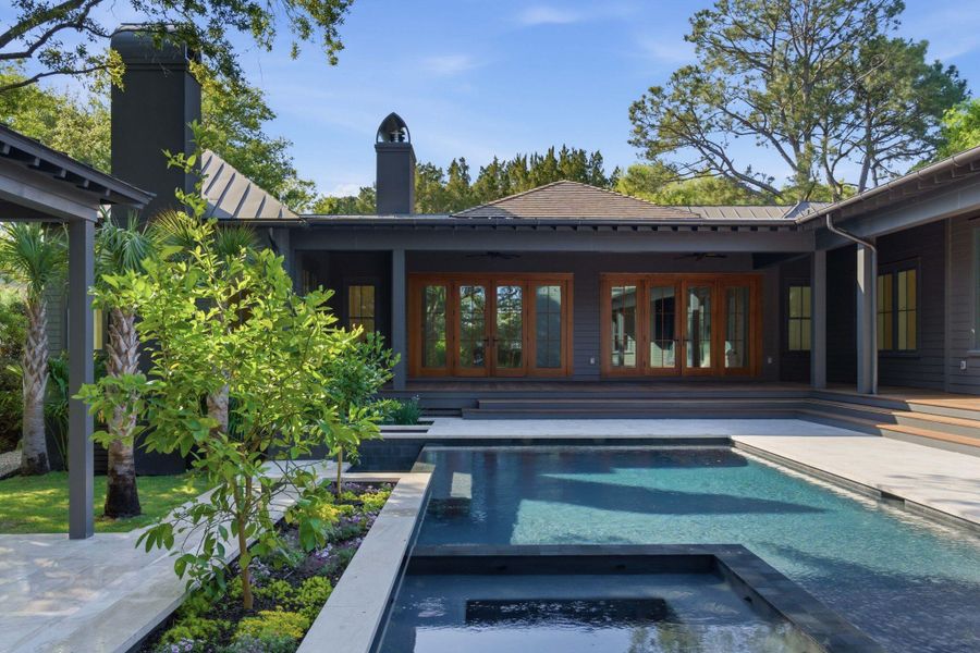 Exterior details and patio area of a home in , Sullivan's Island (Image 27).