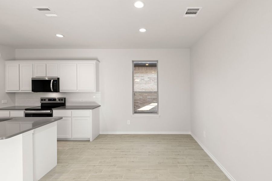 Representative exterior photo of a completed home built from the Maple by Impression Homes in Bryant Farms, Melissa, TX (Image 6). Representative exterior photo of a completed home built from the Maple by Impression Homes in Bryant Farms, Melissa, TX (Image 6).