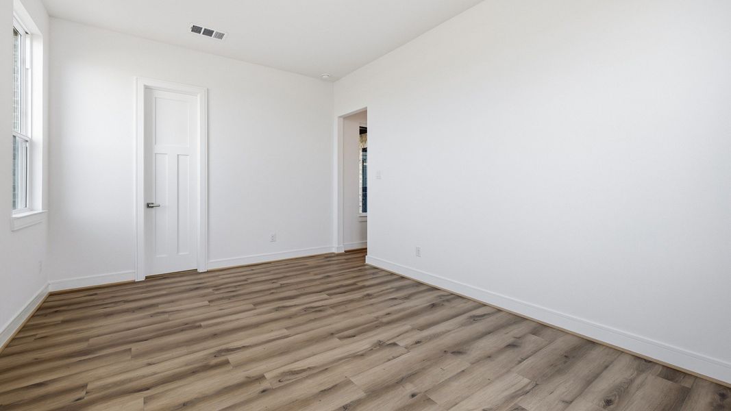Representative furnished interior of a home built from the Paloma by Brightland Homes in Bridgeland Central, Cypress (Image 14).