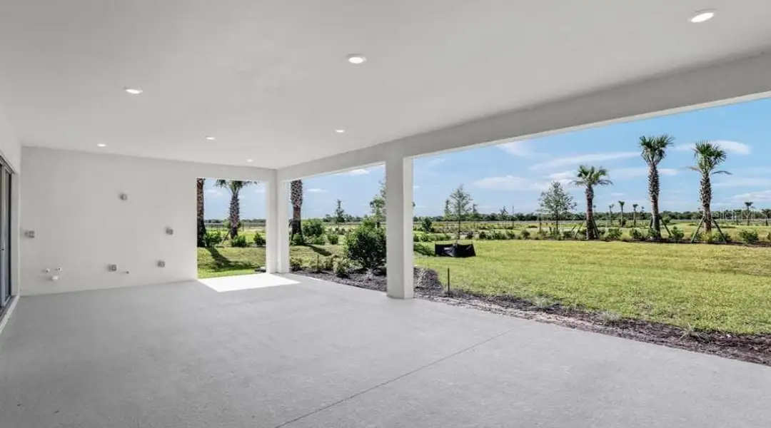 Exterior details and patio area of a home in Esplanade at Starling, Punta Gorda (Image 2). Exterior details and patio area of a home in Esplanade at Starling, Punta Gorda (Image 2).