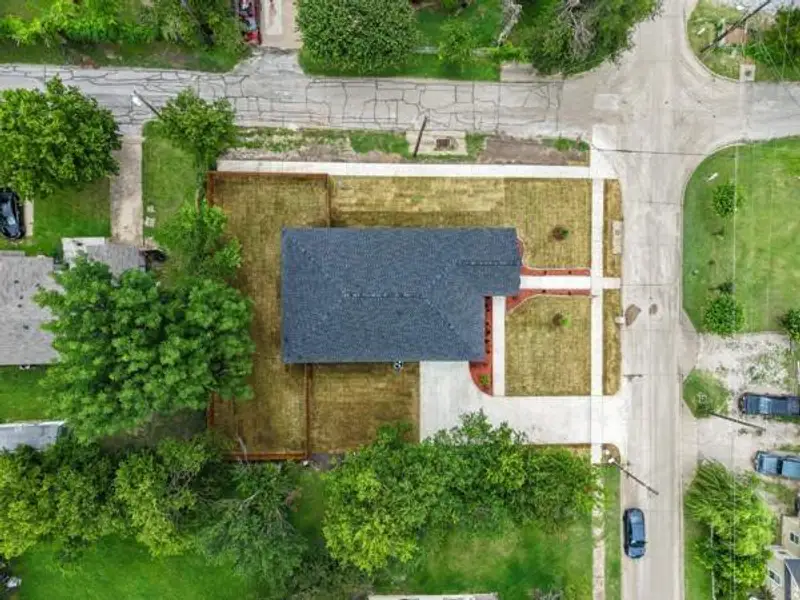 New construction with a dark shingle roof, concrete driveway, and a front walk New construction with a dark shingle roof, concrete driveway, and a front walk