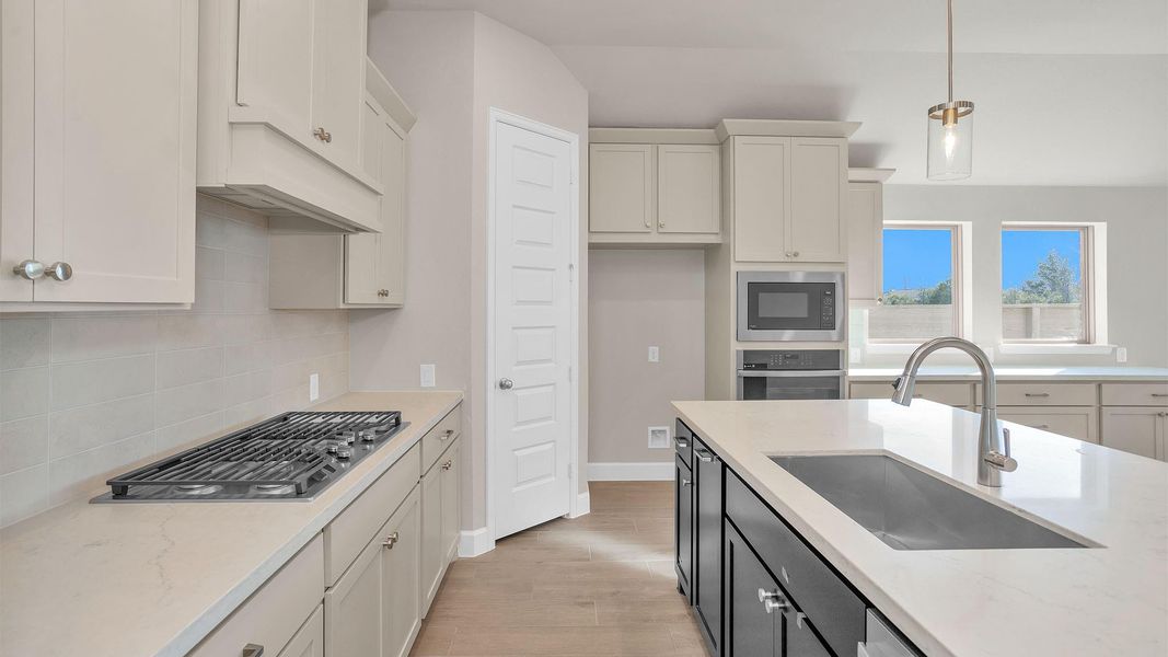 Furnished interior view inside a new home in Legacy, League City (Image 7).