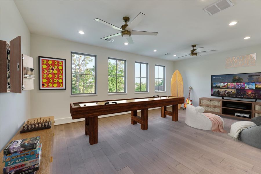 This game room area is perfect for family fun or as an ideal play area, offering plenty of space for entertainment and activities. Virtually staged. This game room area is perfect for family fun or as an ideal play area, offering plenty of space for entertainment and activities. Virtually staged.