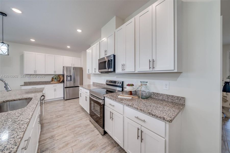 Furnished interior view inside a new home in , Port St. Lucie (Image 47).