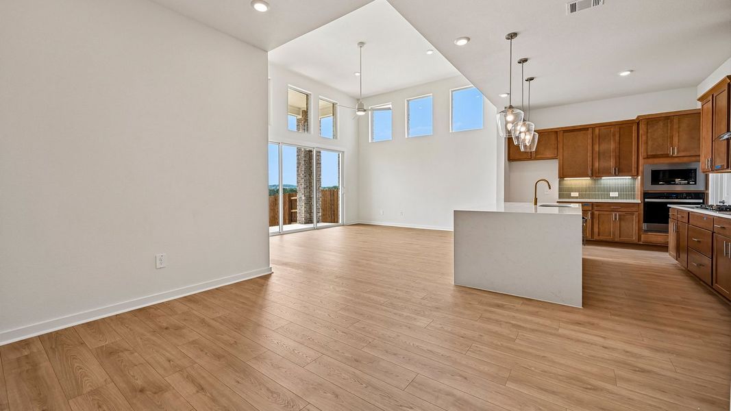 Spacious, unfurnished interior of a new home in The Enclave at Bar W Ranch, Leander (Image 30).