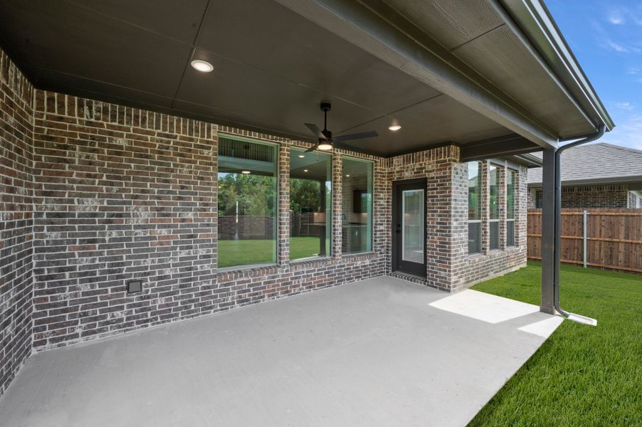 Exterior details and patio area of a home in Mockingbird Hills - Signature Series, Joshua (Image 3).