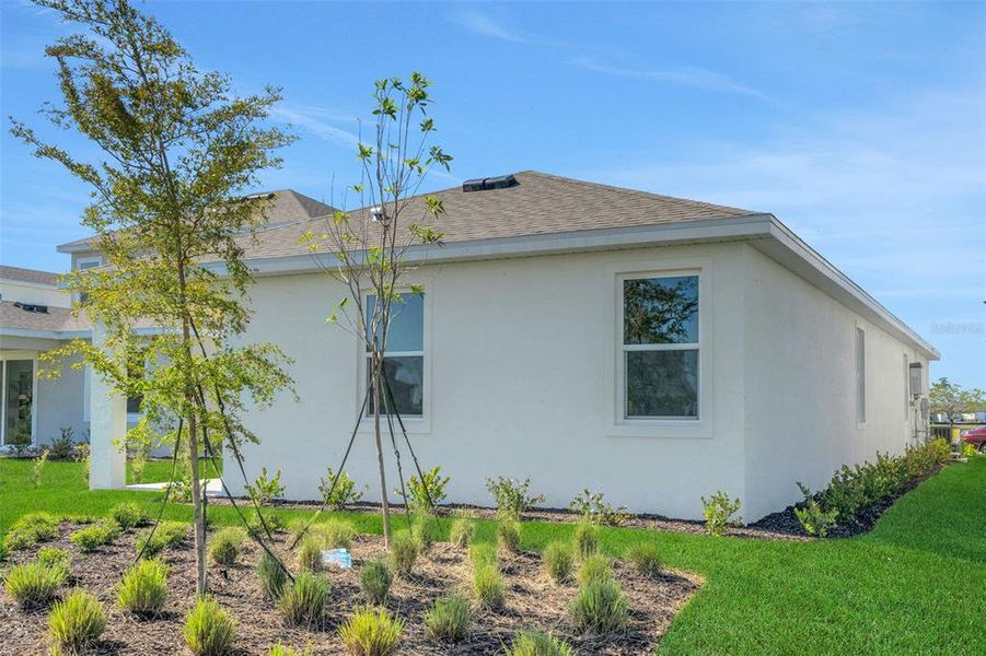 Exterior details and patio area of a home in Creekside Run at Babcock Ranch, Punta Gorda (Image 3).