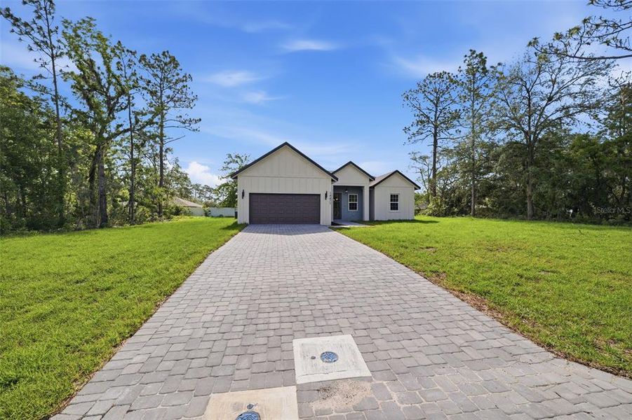 Front exterior of a new home in , Ocala, FL, highlighting curb appeal (Image 20). Front exterior of a new home in , Ocala, FL, highlighting curb appeal (Image 20).