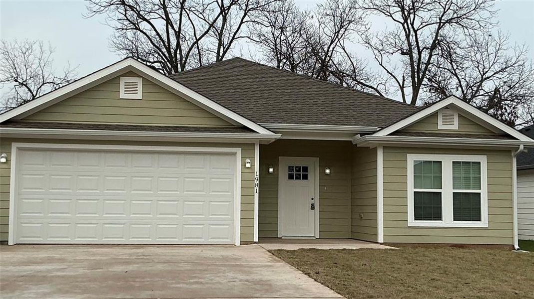 Front exterior of a new home in , Denison, TX, highlighting curb appeal (Image 1).