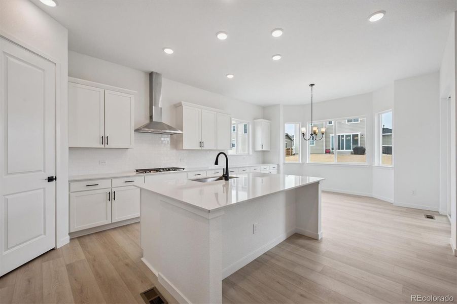 Furnished interior view inside a new home in The Aurora Highlands, Aurora (Image 7).