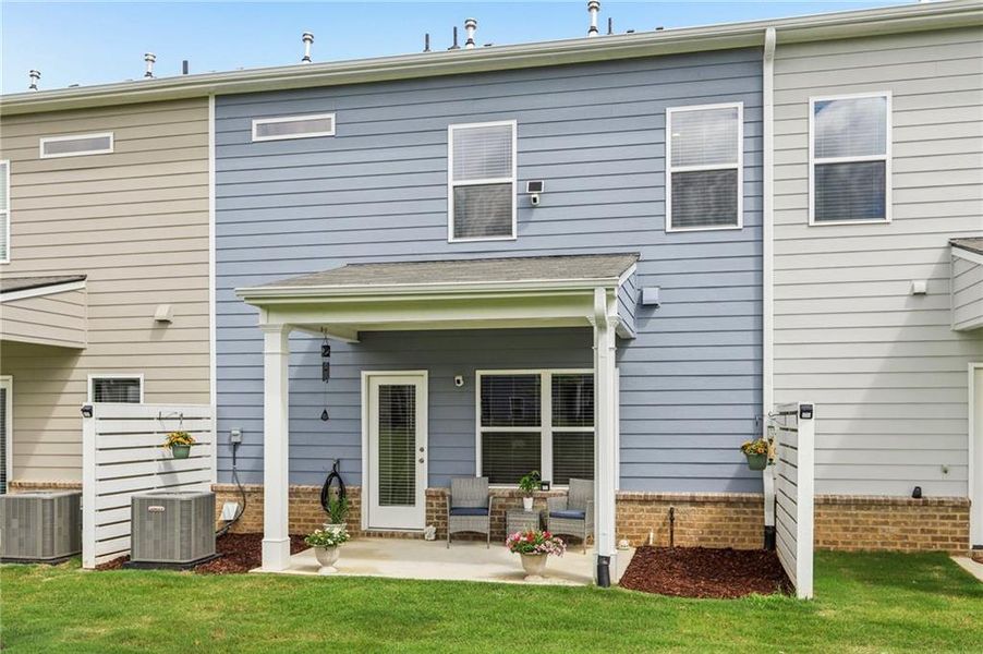 Exterior details and patio area of a home in Ellison Square, Sugar Hill (Image 28).