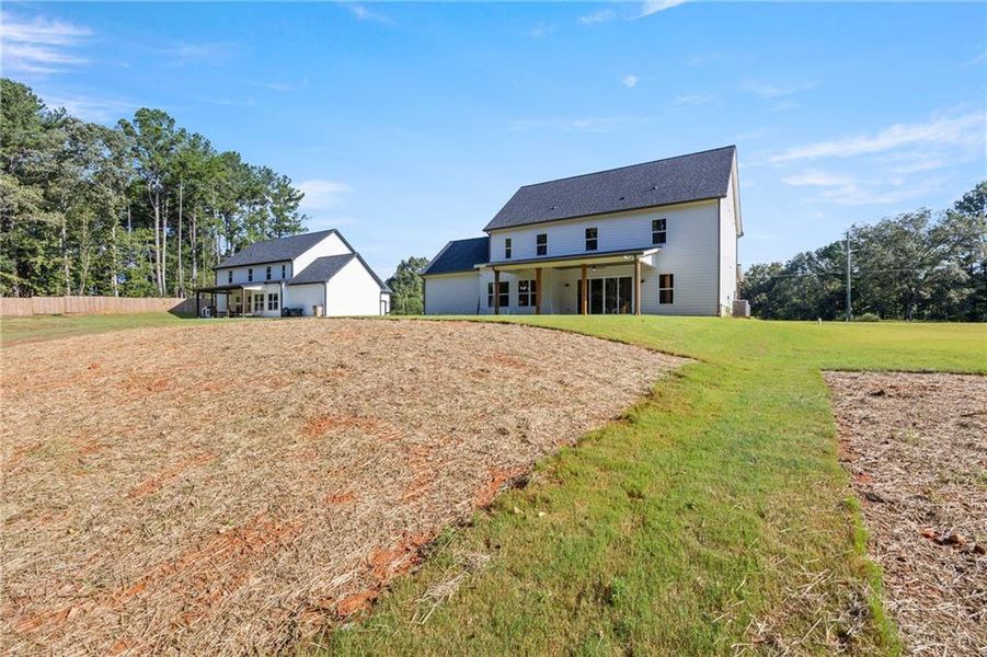 Front exterior of a new home in , Winder, GA, highlighting curb appeal (Image 27).