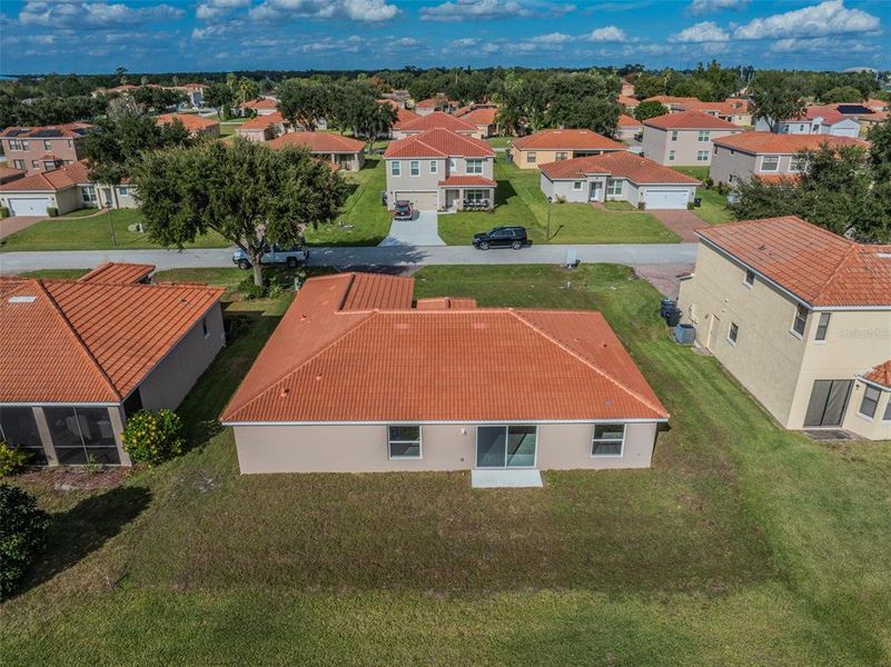 Front exterior of a new home in , Kissimmee, FL, highlighting curb appeal (Image 26).
