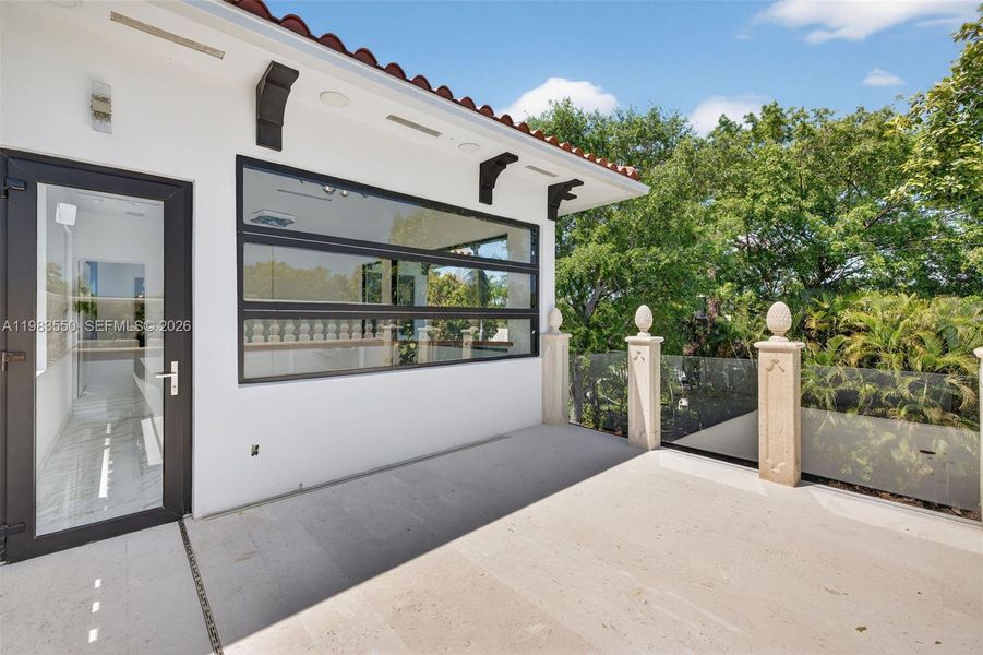 Exterior details and patio area of a home in , Biscayne Park (Image 27).