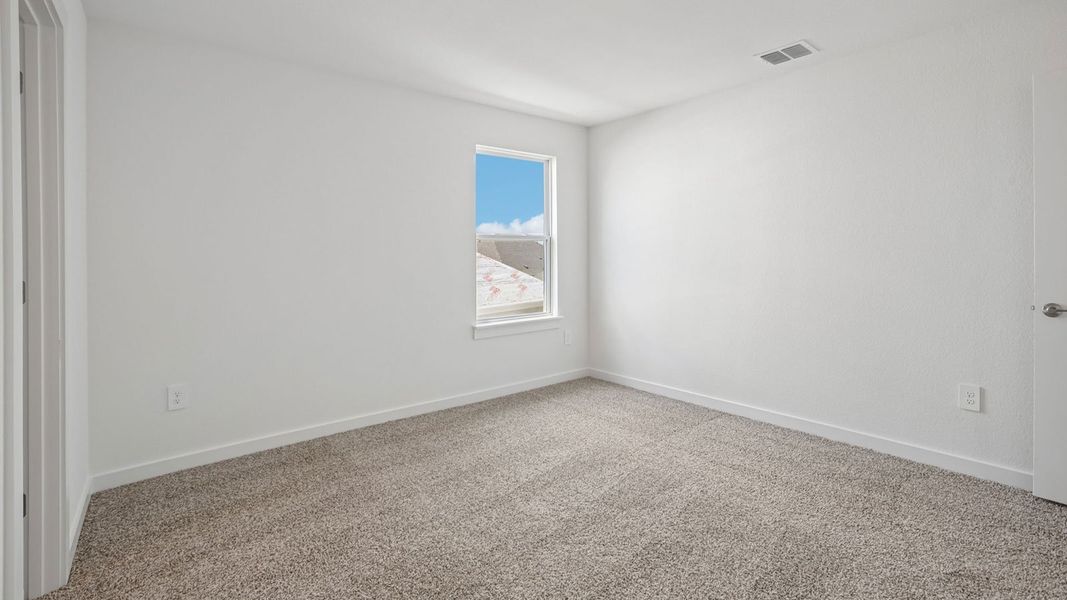 Spacious, unfurnished interior of a new home in Rosenbusch Ranch, Leander (Image 44).
