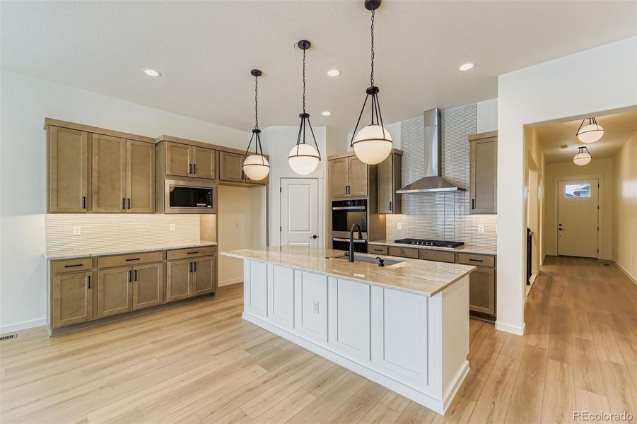Furnished interior view inside a new home in Hilltop 55+ at Inspiration, Aurora (Image 9). Furnished interior view inside a new home in Hilltop 55+ at Inspiration, Aurora (Image 9).