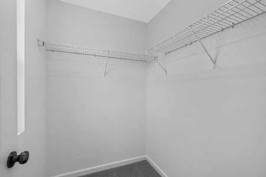 Spacious, unfurnished interior of a new home in Weatherfield, Buford (Image 25).