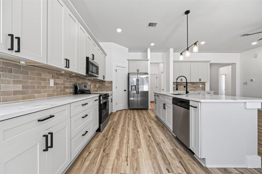 Furnished interior view inside a new home in , Conroe (Image 16).
