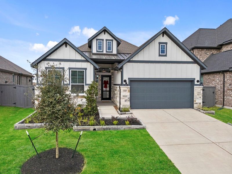 Front exterior of a new home in Jubilee Chateau, Hockley, TX, highlighting curb appeal (Image 24).