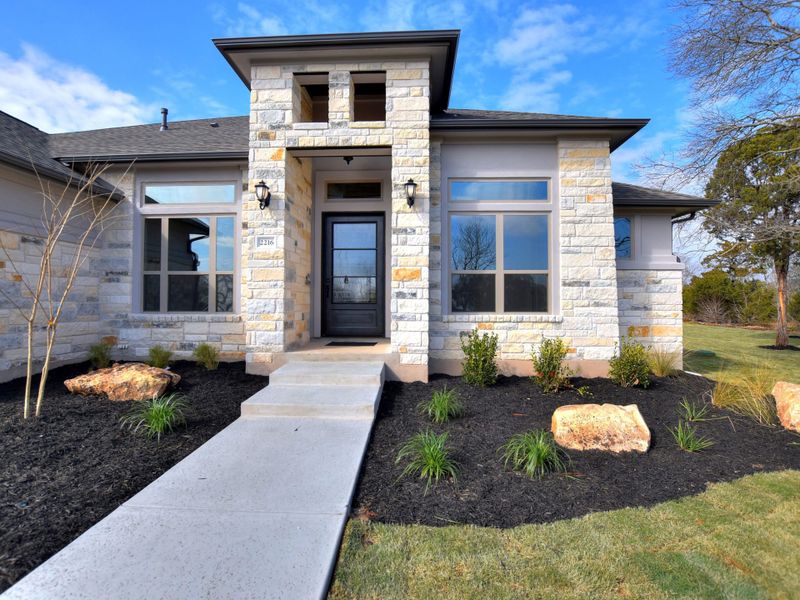 Representative exterior photo of a completed home built from the San Simeon I by Giddens Homes in Clearwater Ranch, Liberty Hill, TX (Image 49).