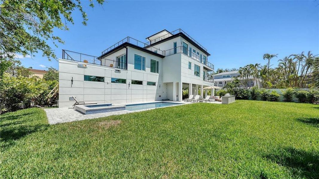 Exterior details and patio area of a home in , Sarasota (Image 23).